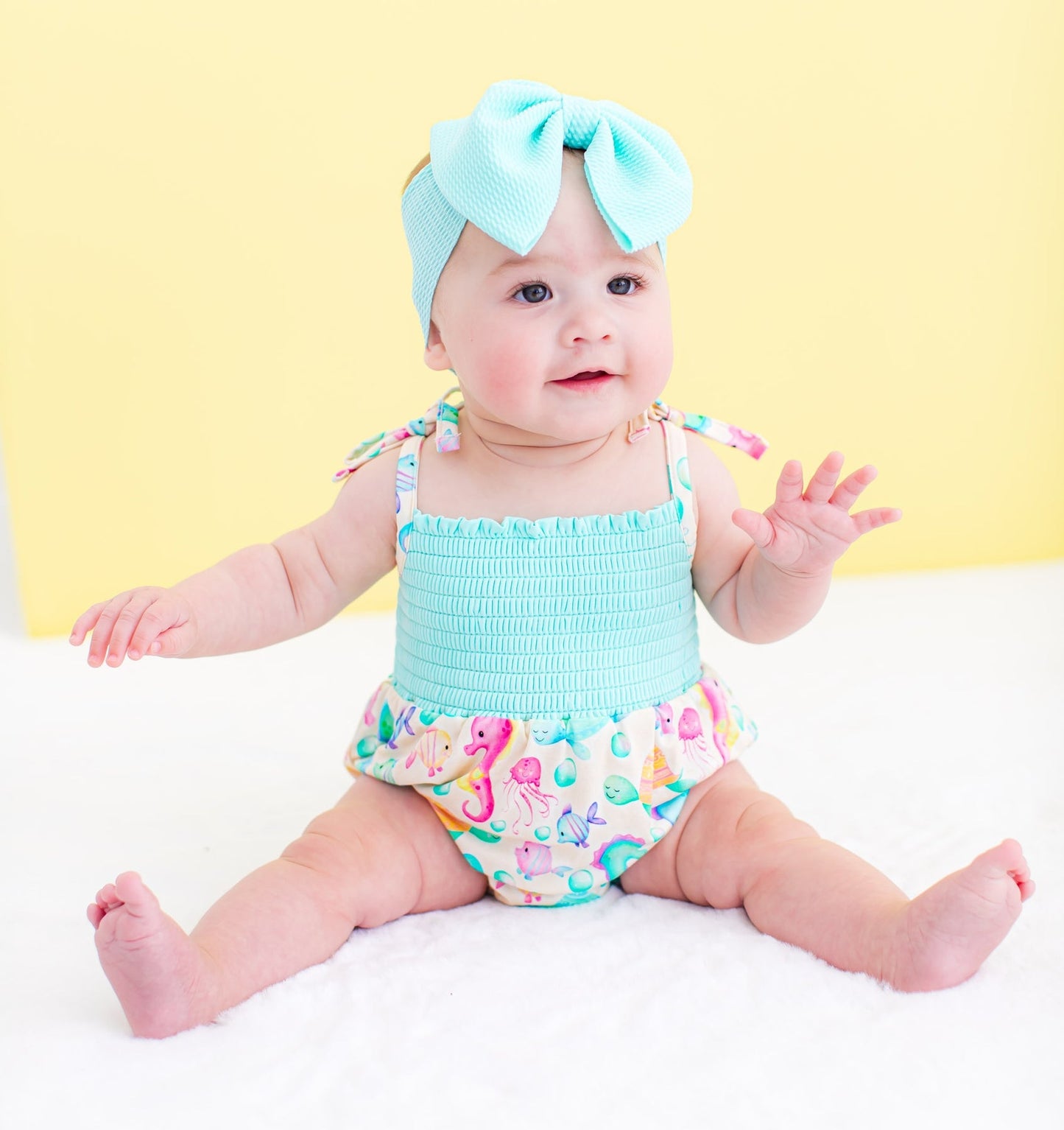Coral Smocked Birdie Bubble