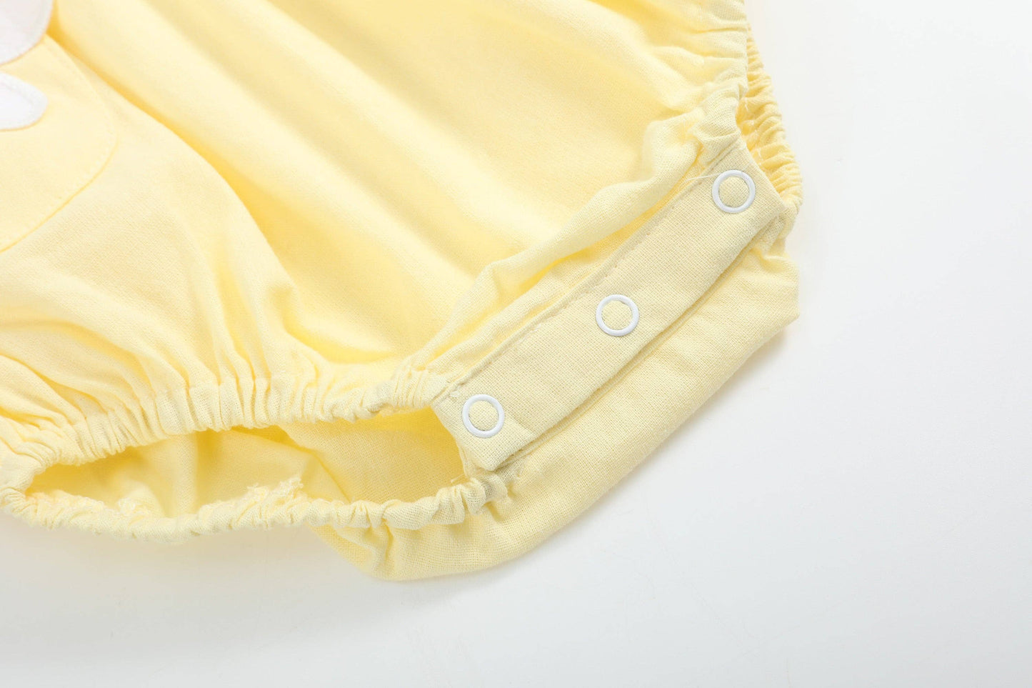 Yellow Daisy Pocketed Smocked Flutter Romper