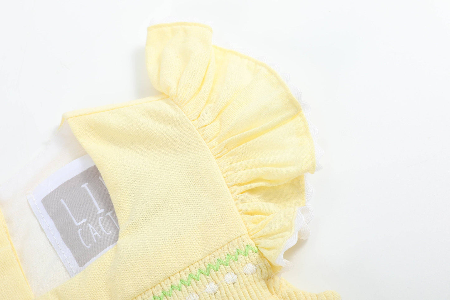 Yellow Daisy Pocketed Smocked Flutter Romper